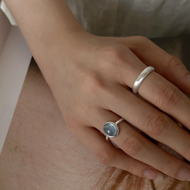 blue gemstone aquamarine 925 silver ring handcrafted minimalist design wear on woman