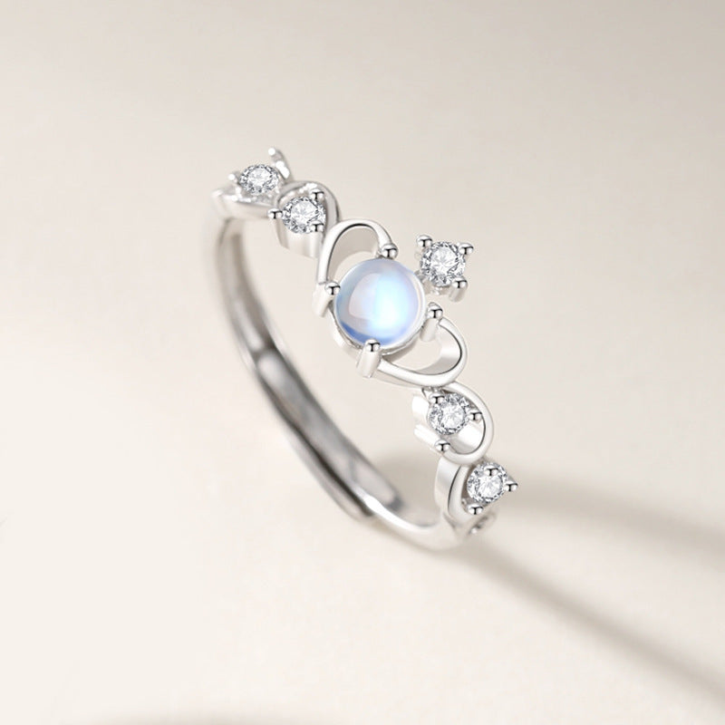 Crown-shaped adjustable moonstone ring with luminous glow