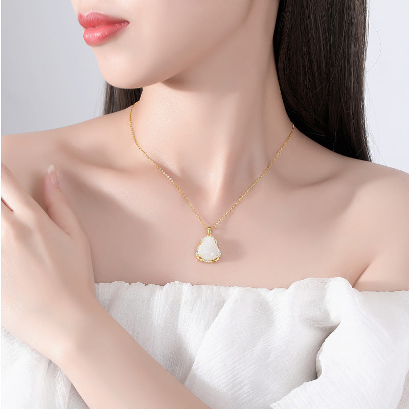Lifestyle shot wearing Hetian jade Buddha necklace