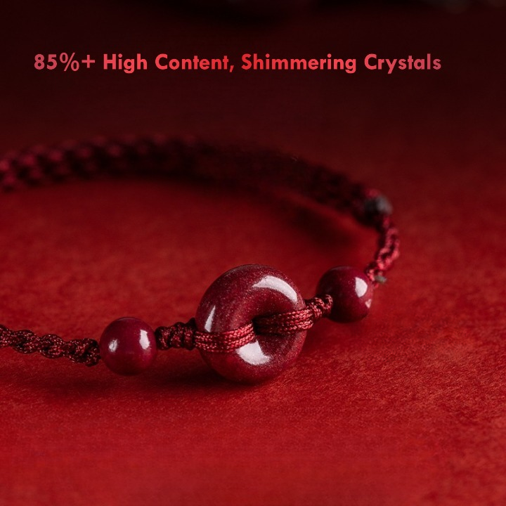 Close-up of cinnabar donut bead on handmade red string bracelet