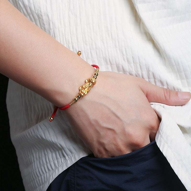 Red string Feng Shui bracelet with Pixiu charm for protection and luck