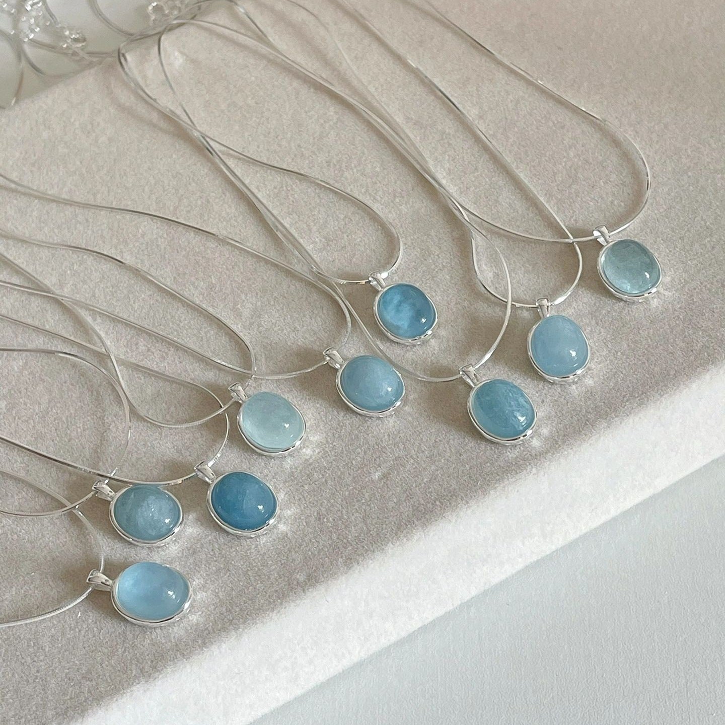 Natural Aquamarine Jewelry – close-up of polished blue gemstone pendant