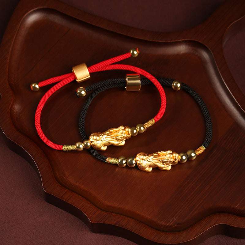 Red string Feng Shui bracelet with Pixiu charm for protection and luck