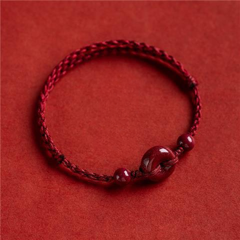 Adjustable red string bracelet with natural cinnabar donut bead – Feng Shui jewelry