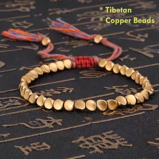Tibetan copper bracelet showing brushed metal surface and natural patina