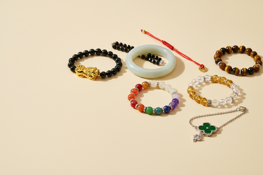 Spiritual bracelets featuring Pixiu, jade, black obsidian, tiger eye, citrine, chakra stones, and red string symbols for wealth, protection, balance, and mindfulness