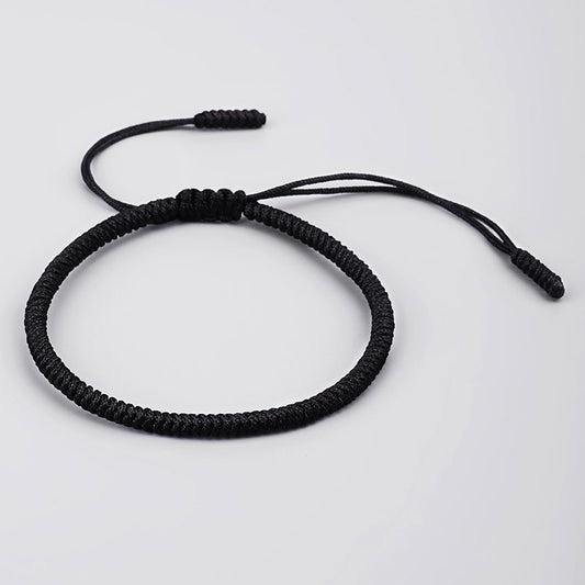Close-up of handcrafted Tibetan protection knot details