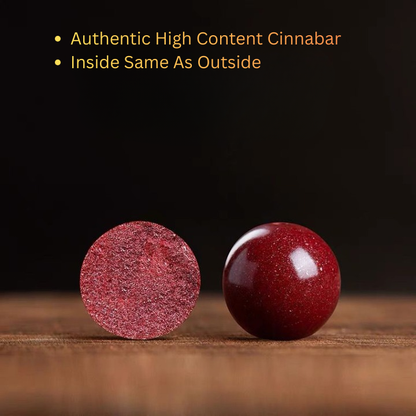 red cinnabar stud earrings close-up