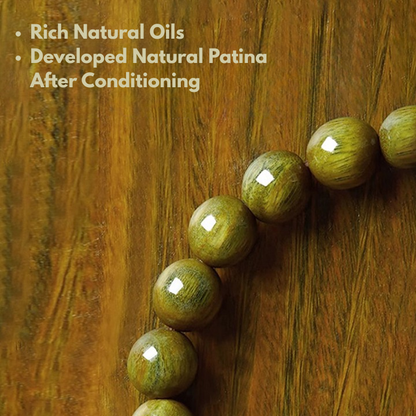 Naturally oxidized green sandalwood beads with deeper green tone on Black Obsidian and Green Sandalwood Bracelet
