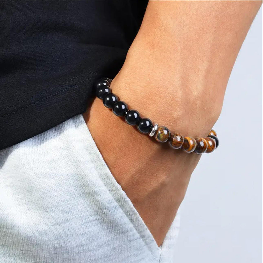 Man wearing a Black Obsidian Tiger Eye and Hematite bracelet