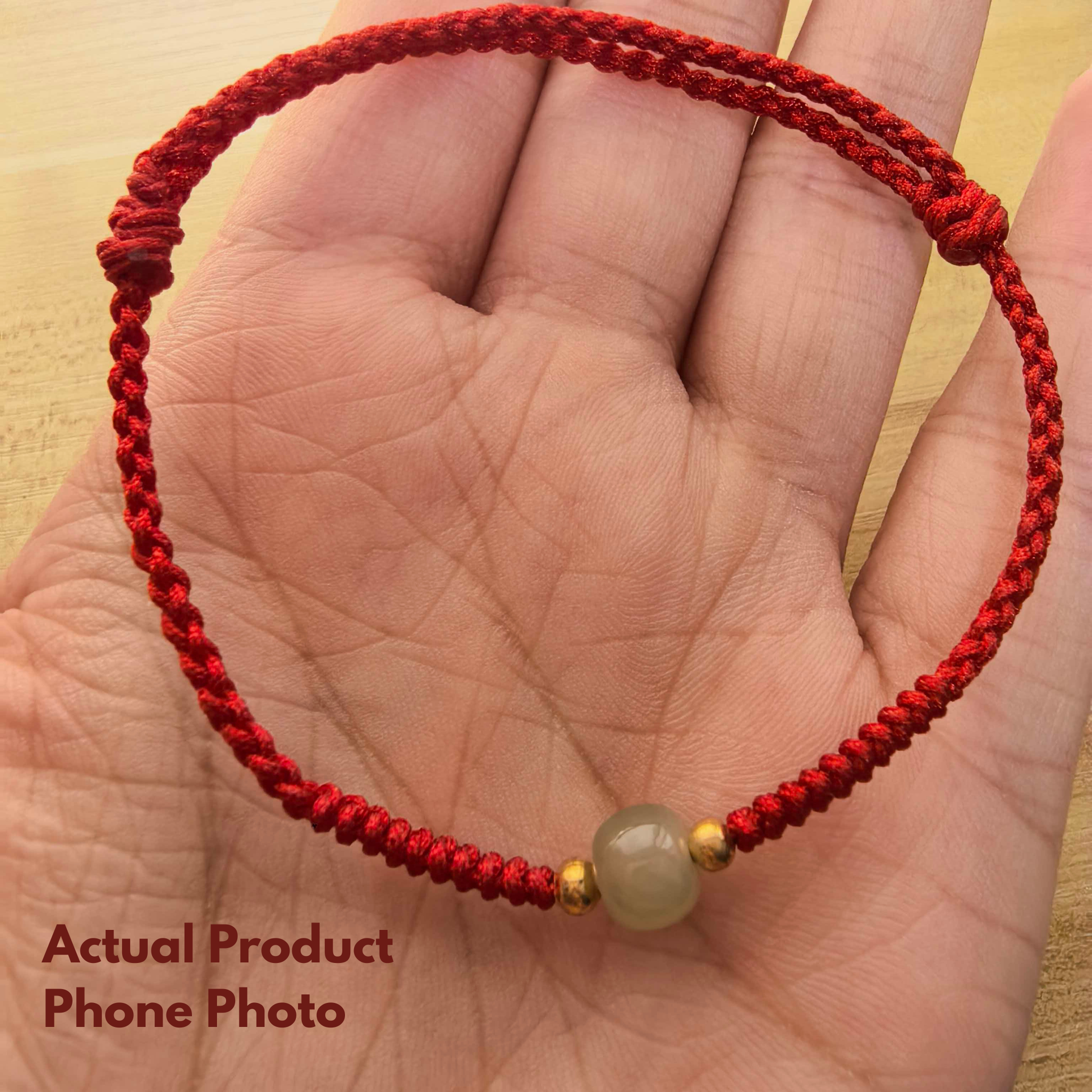 Handmade red string knot detail with green Hetian jade bracelet