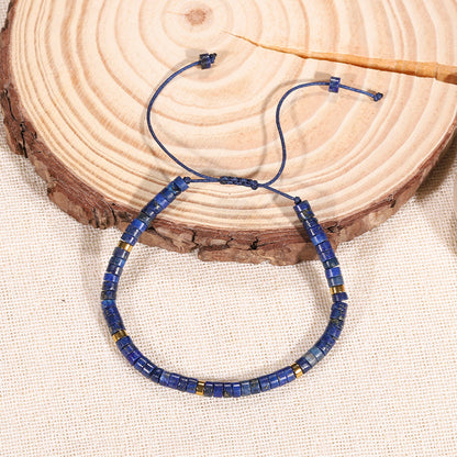 blue lapis lazuli bracelet with gold accents