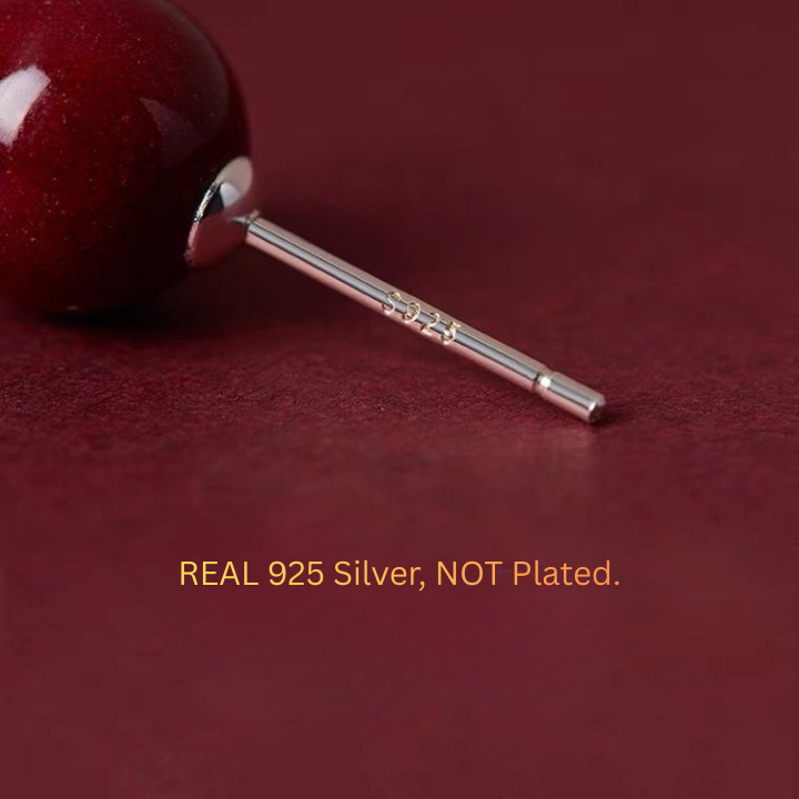 red gemstone earrings in sterling silver