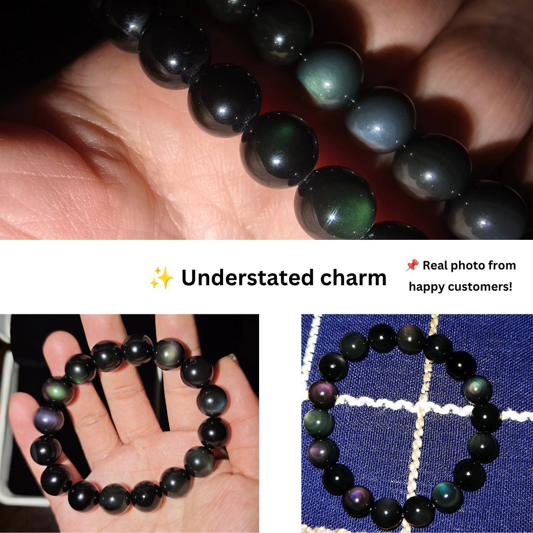 Close-up of natural rainbow-eye flash on polished black obsidian gemstone beads