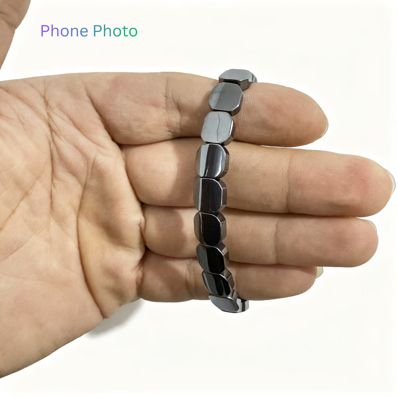 Men wearing hematite bracelet for grounding and protection