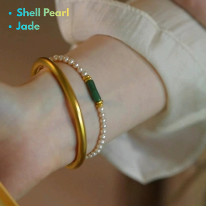 Shell Pearl Bracelet for Women with Jade Center wear on woman's wrist
