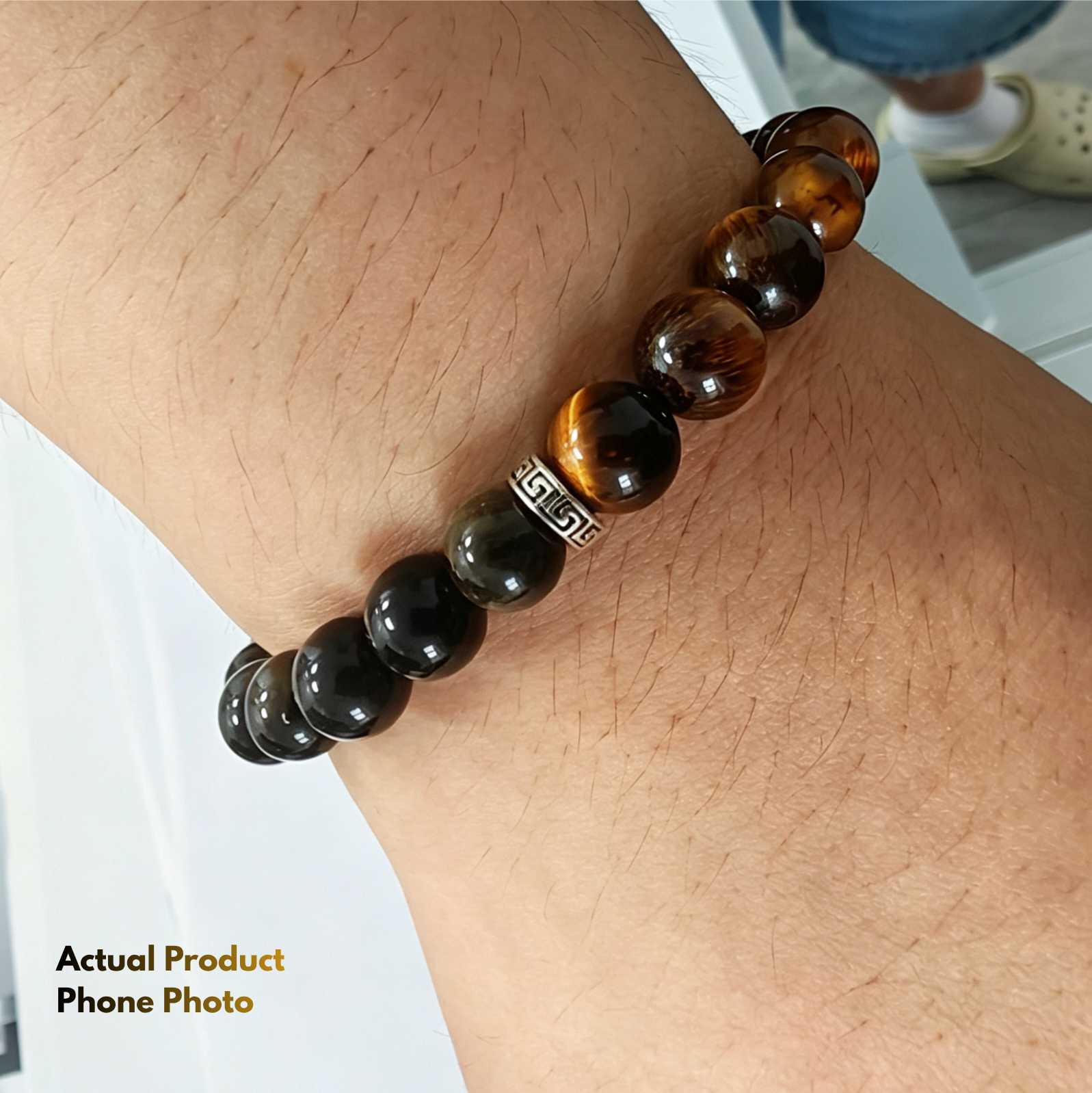Protection Bracelet for Men with Tiger Eye and Black Obsidian wear on men's wrist close up look