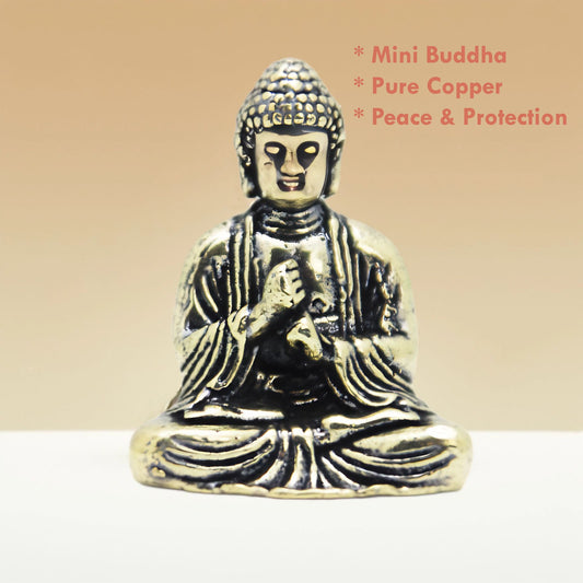 Mini pure copper Buddha statue on white background