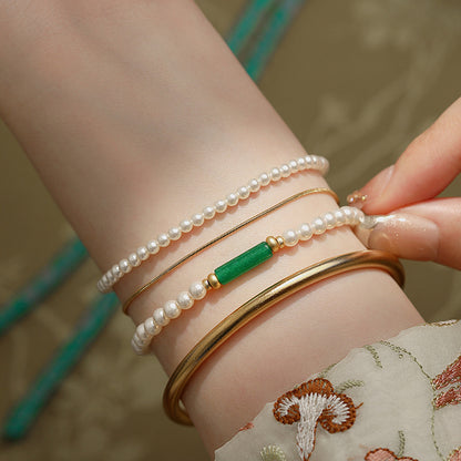 Real pearl bracelet shell pearls jade center 925 silver closeup